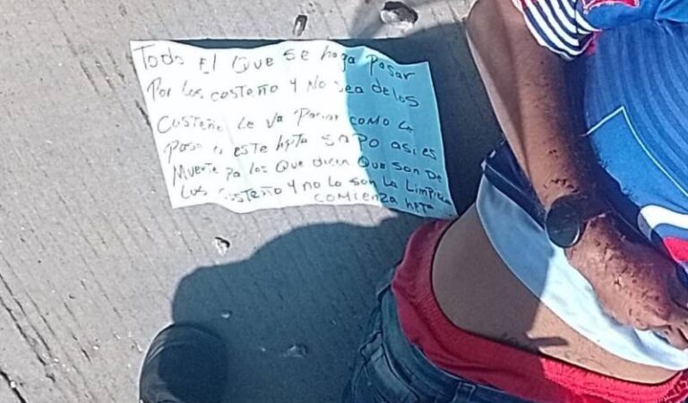 Matan a tiros en la calle a una persona y le dejan un mensaje de amenaza